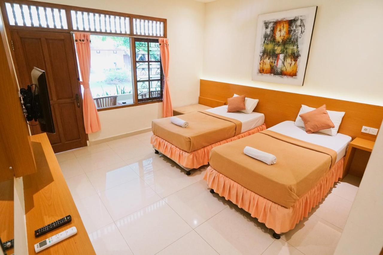 Sari Bali Cottage กูตา ภายนอก รูปภาพ